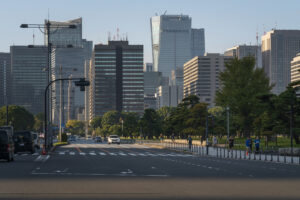 Kasumigaseki Government District in Chiyoda City on the background of the Outer Gardens of the Imperial Palace on a sunny day, Tokyo, Japan